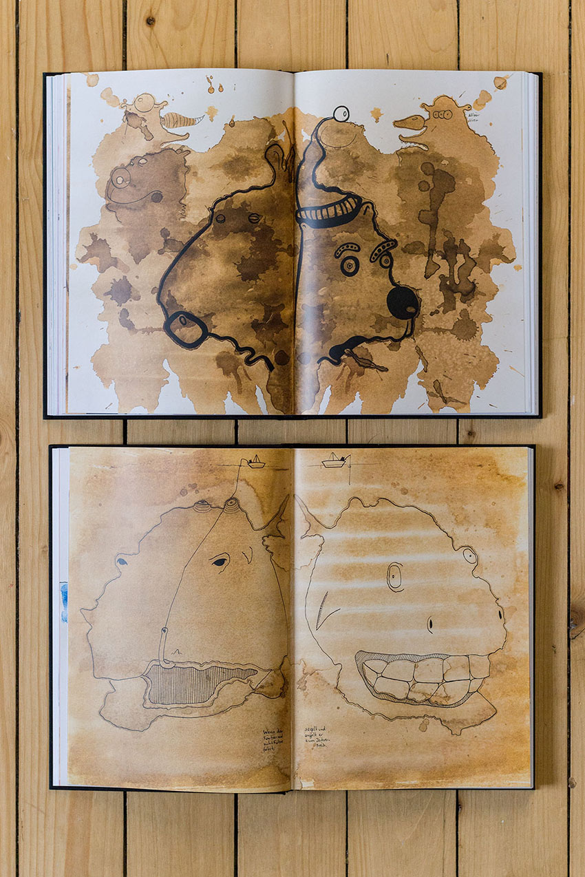 Das Bärenbuch gemütlich offen auf Boden - Das Bärenbuch, lustige Wortwitze mit Bären im Cartoon und Comicstil von Künstler, Illustrator und Autor Markus Wülbern